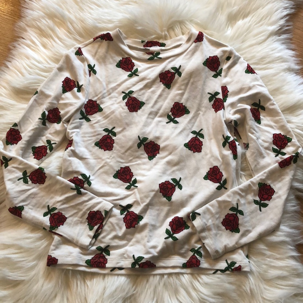 White shirt with red roses